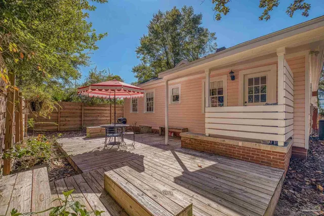 swimming pool view with a seating space
