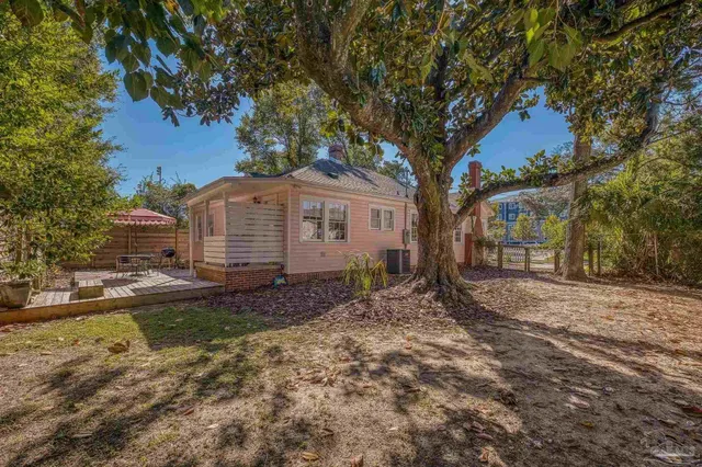 a house view with a backyard space