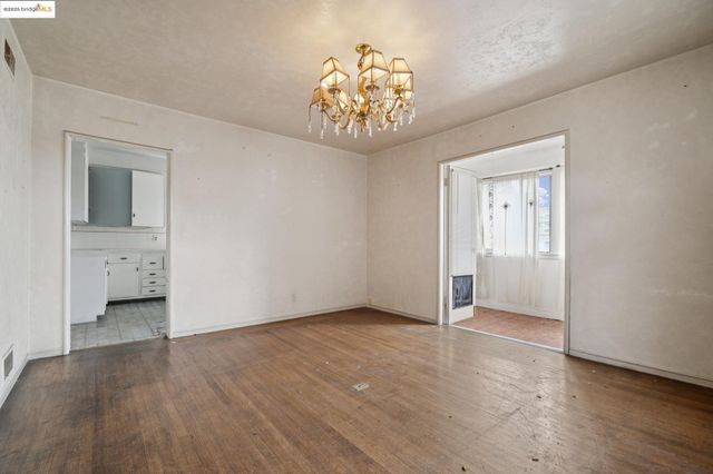 a bathroom with a double vanity sink a mirror and a bathtub
