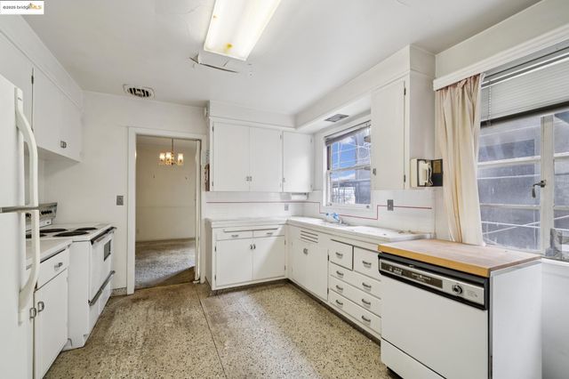 a bathroom with a sink toilet and mirror