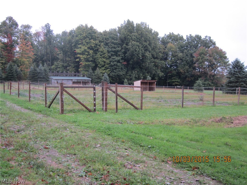 4461 Fairground Road Atwater, OH 44201 - Photo 2 of 15 Fenced Pasture, Notice the stable at the far end of the corral.