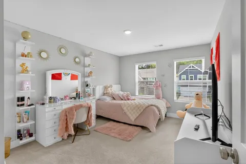 a room with furniture and a window