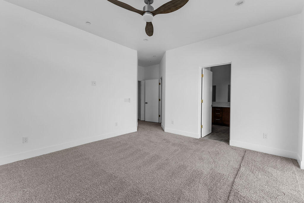 66751 San Felipe Road Desert Hot Springs, CA 92240 - Photo 24 of 59 an empty room with a ceiling fan