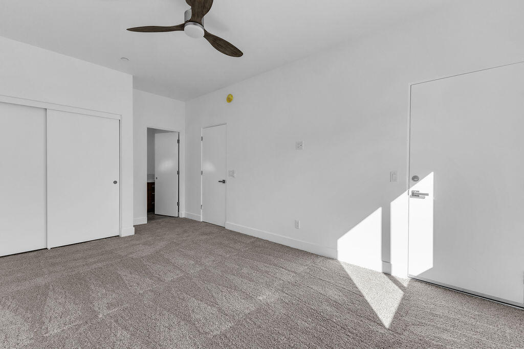 66751 San Felipe Road Desert Hot Springs, CA 92240 - Photo 36 of 59 a view of an empty room with a ceiling fan