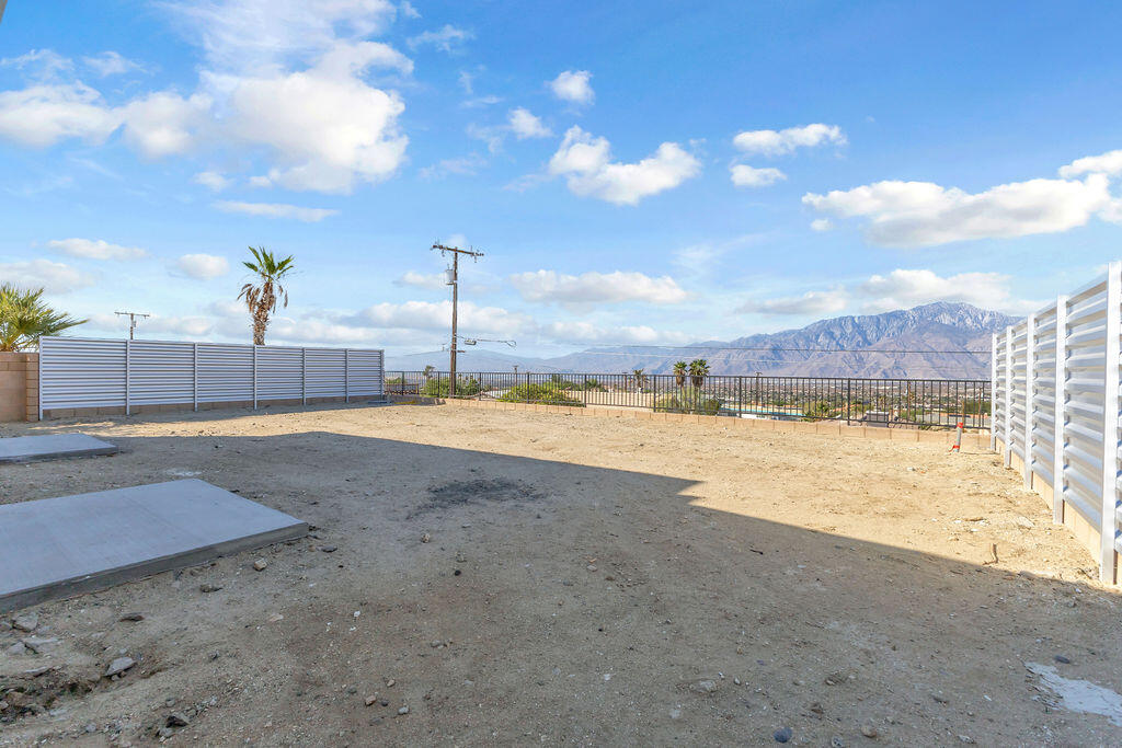 66751 San Felipe Road Desert Hot Springs, CA 92240 - Photo 42 of 59 a view of a house with a yard