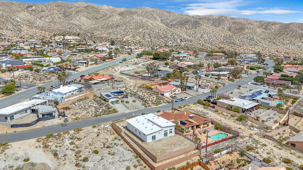 66751 San Felipe Road Desert Hot Springs, CA 92240 - Photo 46 of 59 an aerial view of residential houses with outdoor space