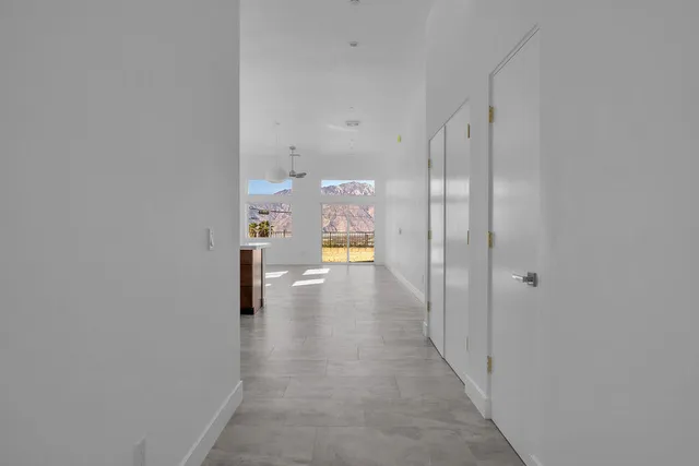 a kitchen with a sink stove and refrigerator