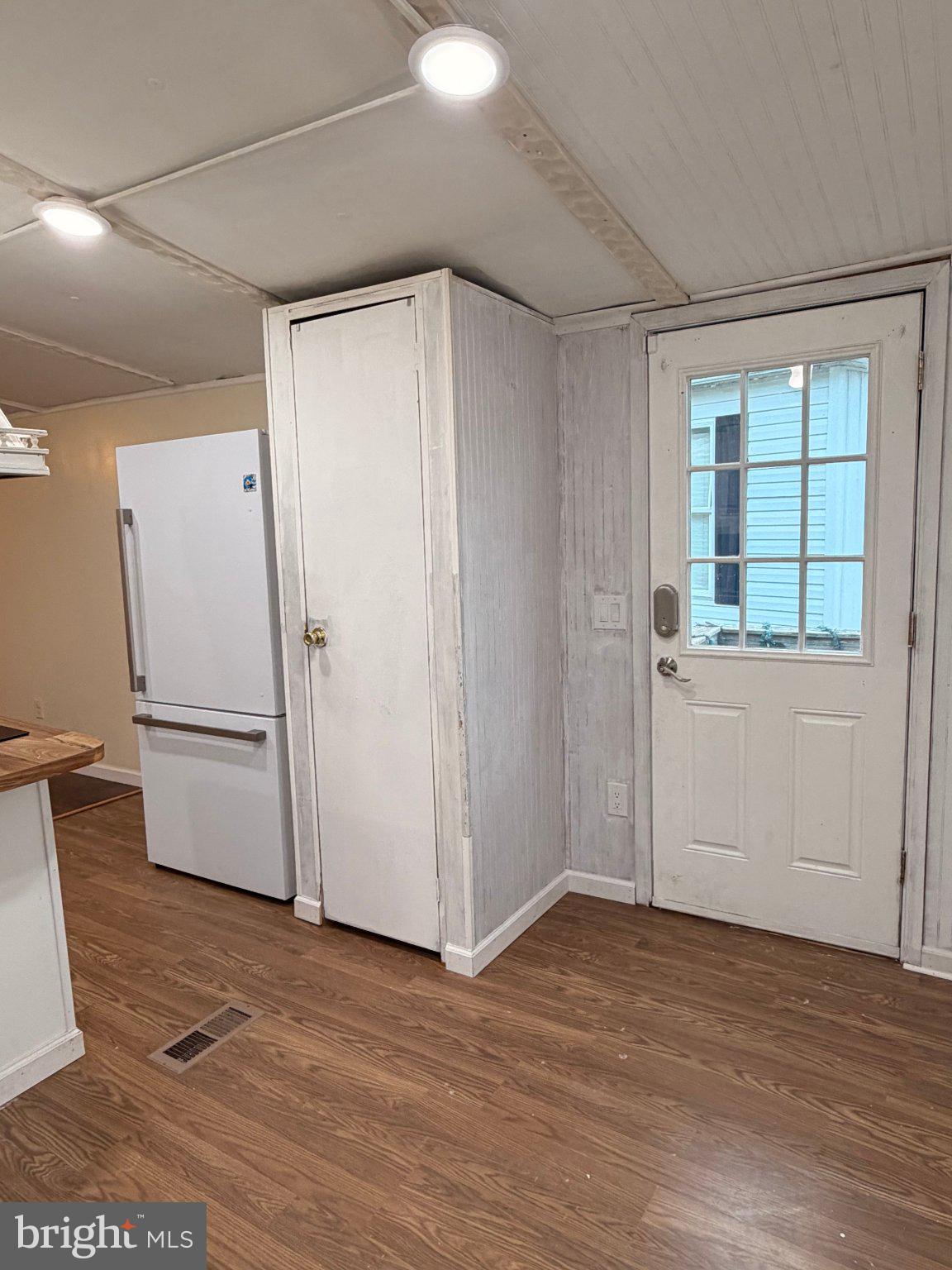 24 Carpenter Street, Unit 24 Dover, DE 19901 - Photo 22 of 27 Bright and inviting kitchen entryway.