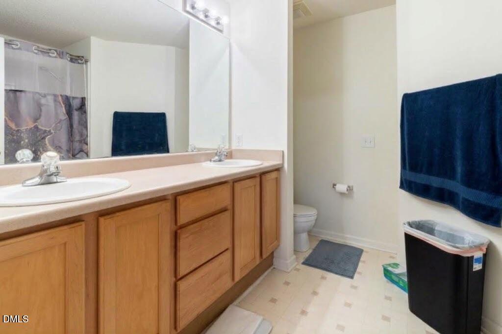 4414 Pottery Lane Raleigh, NC 27616 - Photo 11 of 19 Primary Bathroom (virtually staged/decluttered)