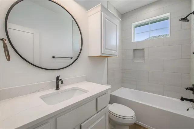 a front view of house with yard and garage