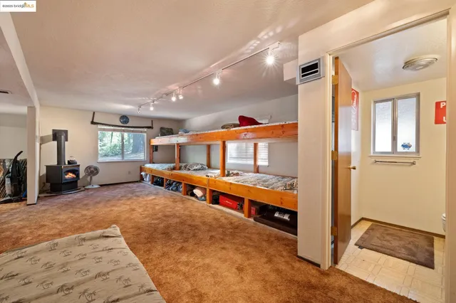a view of a living room and bathroom