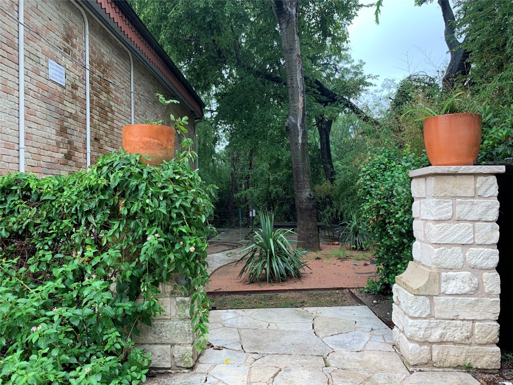 407 East 45th Street, Unit 116 Austin, TX 78751 - Photo 15 of 19 View of yard with a patio area