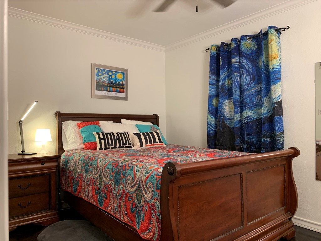 407 East 45th Street, Unit 116 Austin, TX 78751 - Photo 5 of 19 Bedroom featuring crown molding and ceiling fan
