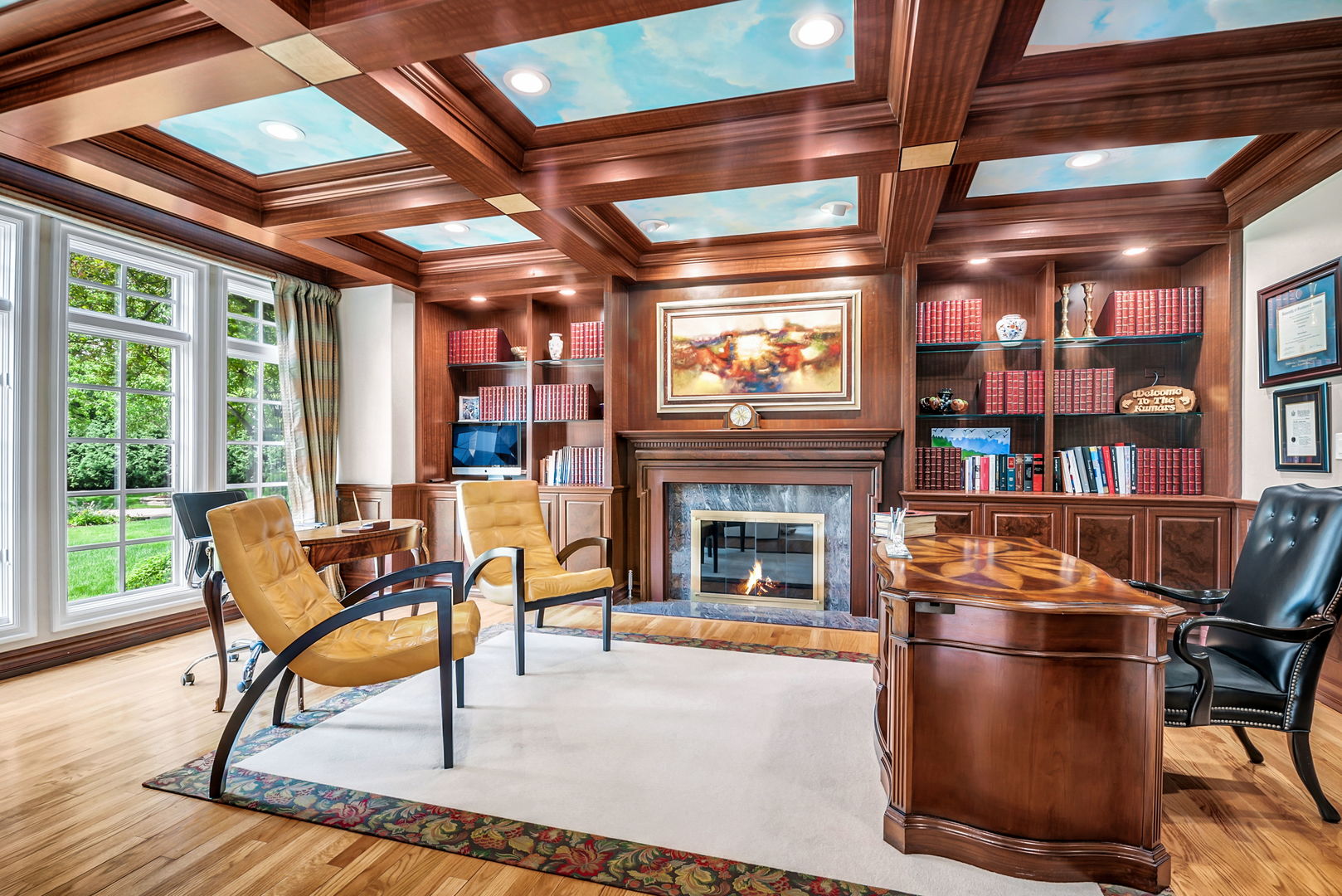 210 Indian Trail Road Oak Brook, IL 60523 - Photo 11 of 48 a work room with furniture and a fireplace