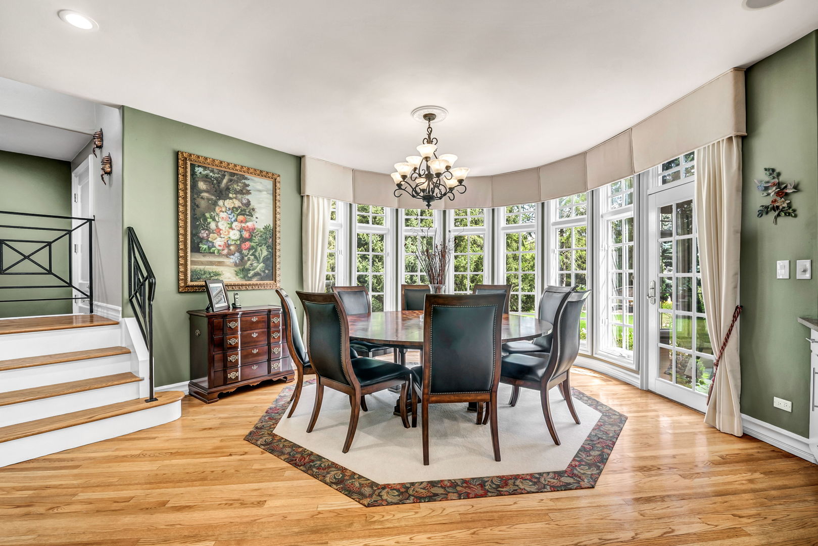 210 Indian Trail Road Oak Brook, IL 60523 - Photo 14 of 48 a view of a dining room with furniture window and wooden floor