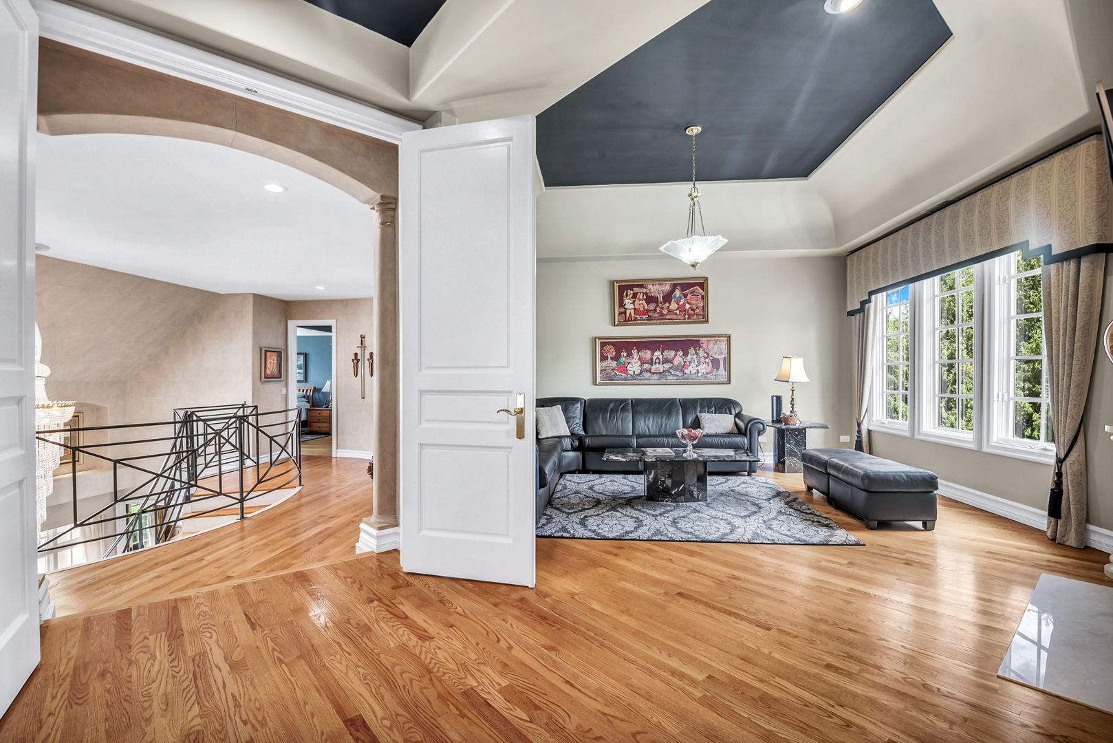 210 Indian Trail Road Oak Brook, IL 60523 - Photo 15 of 48 a living room with furniture and wooden floor