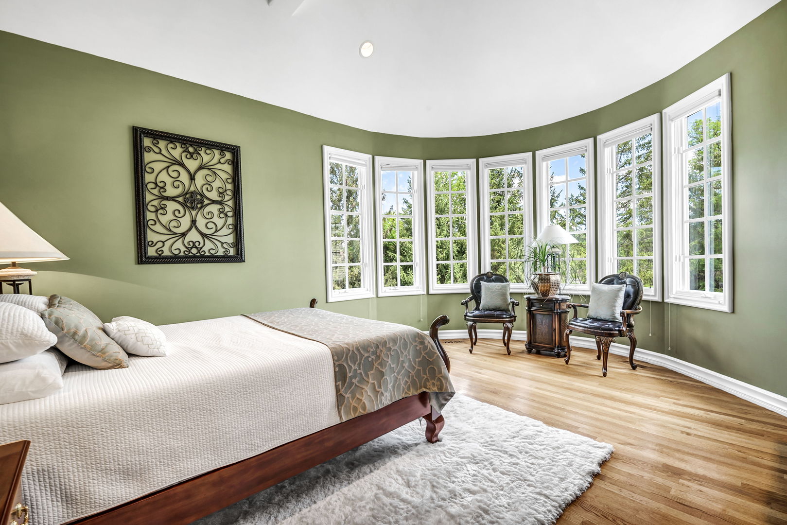 210 Indian Trail Road Oak Brook, IL 60523 - Photo 22 of 48 a bedroom with a bed and wooden floor