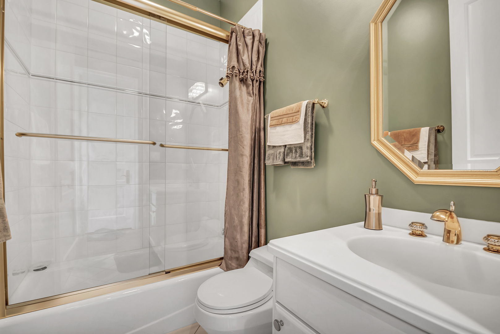 210 Indian Trail Road Oak Brook, IL 60523 - Photo 23 of 48 a bathroom with a sink toilet and shower