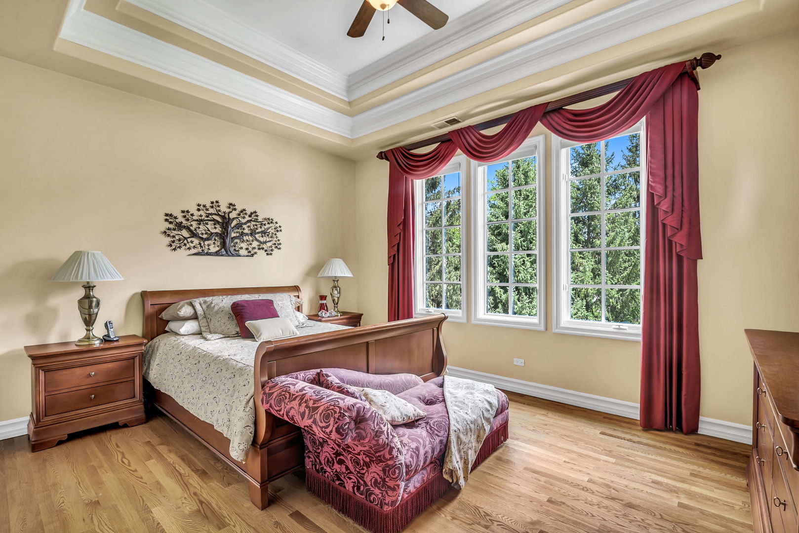 210 Indian Trail Road Oak Brook, IL 60523 - Photo 26 of 48 a bedroom with a bed and a window
