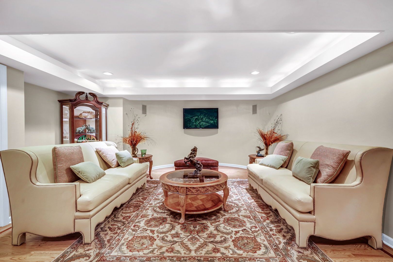 210 Indian Trail Road Oak Brook, IL 60523 - Photo 32 of 48 a living room with furniture and a flat screen tv