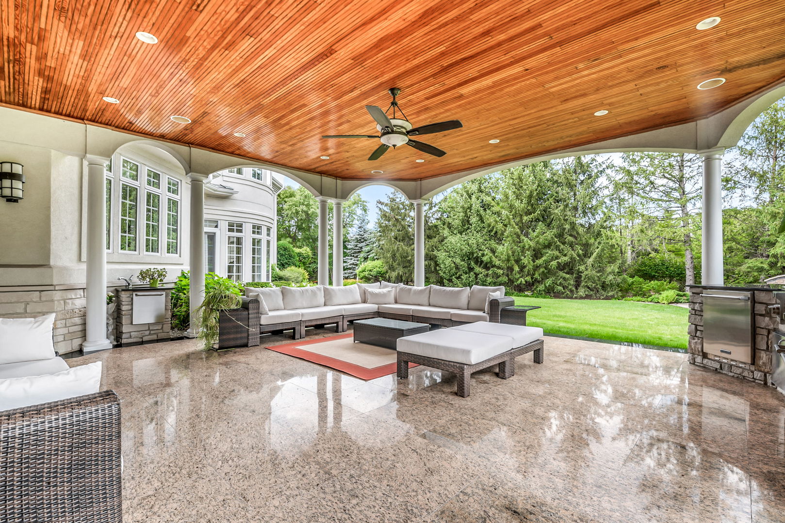 210 Indian Trail Road Oak Brook, IL 60523 - Photo 35 of 48 a backyard of a house with a garden and outdoor seating