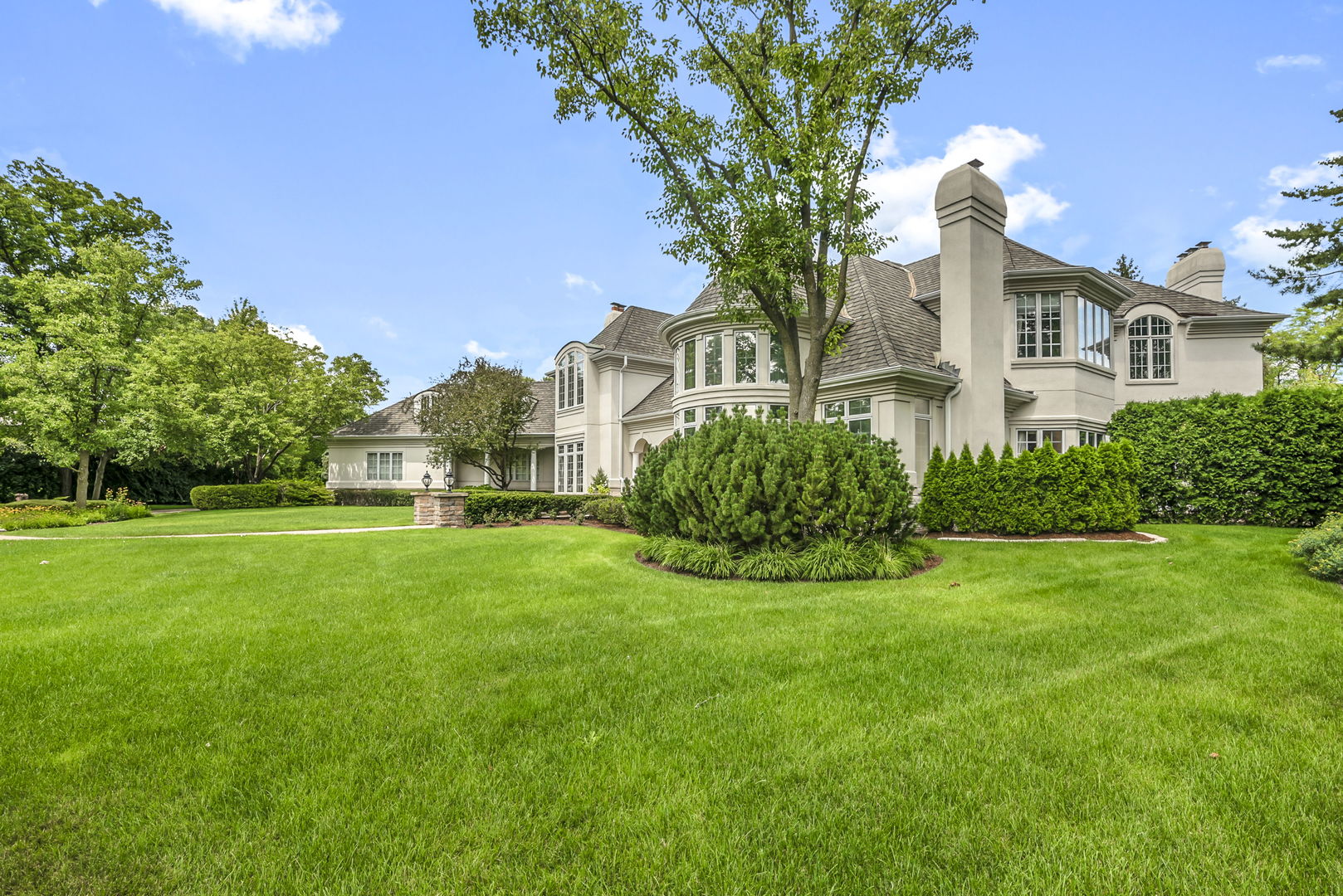210 Indian Trail Road Oak Brook, IL 60523 - Photo 37 of 48 a front view of a house with a yard