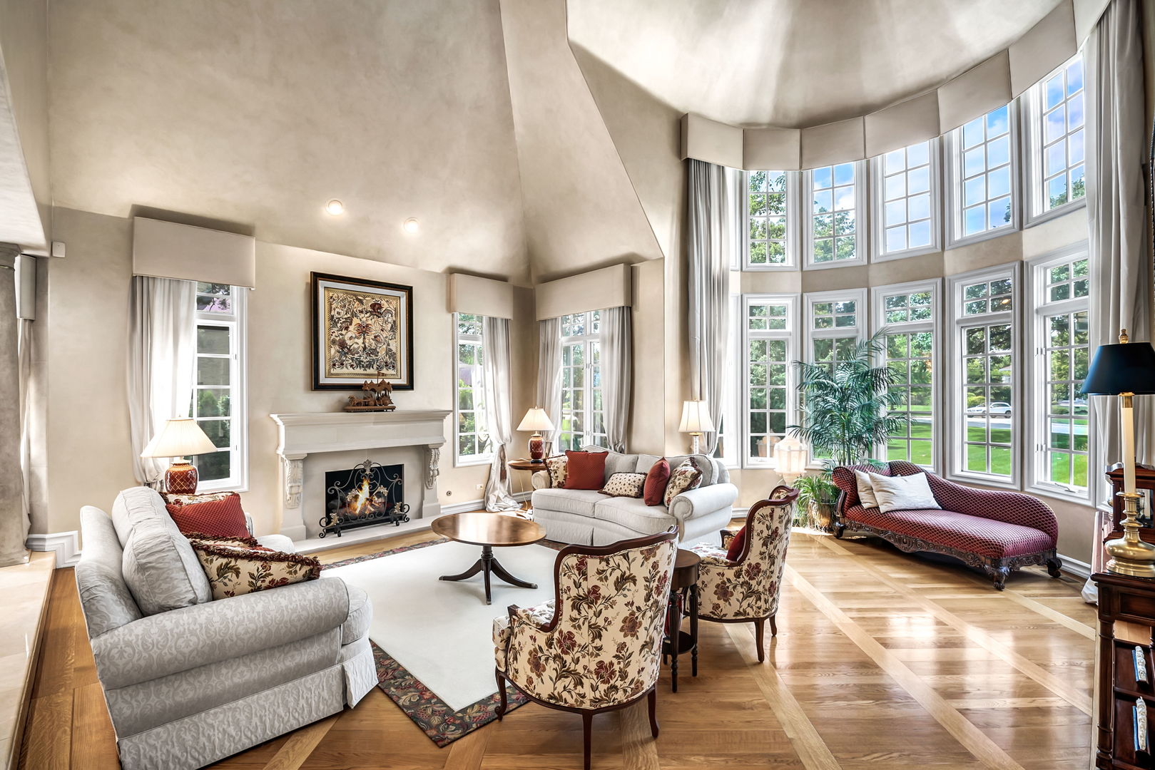 210 Indian Trail Road Oak Brook, IL 60523 - Photo 9 of 48 a living room with furniture large window and a fireplace