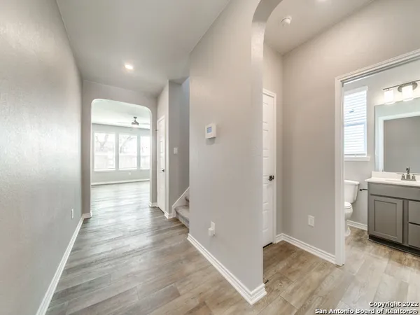 a view of entryway with wooden floor
