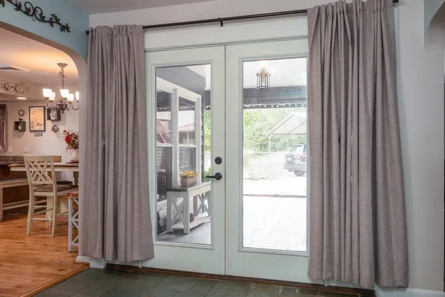 a view of room with furniture and window