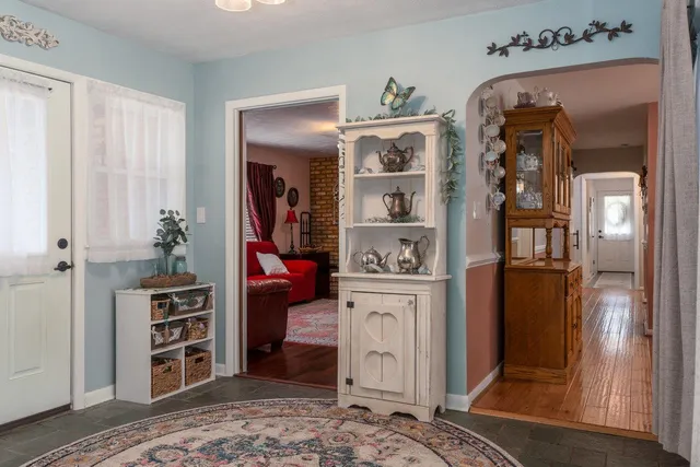 a kitchen with stainless steel appliances a refrigerator and cabinets