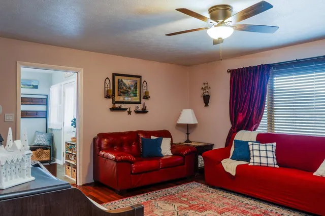 a kitchen with stainless steel appliances a refrigerator a sink and cabinets