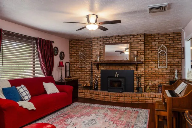 a white toilet sitting next to a shower curtain
