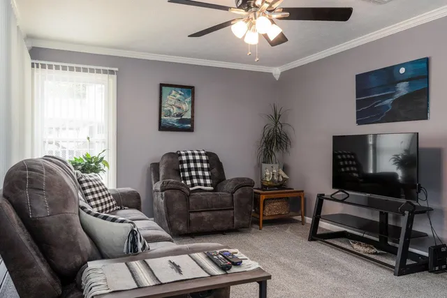 a bedroom with a bed and cabinets