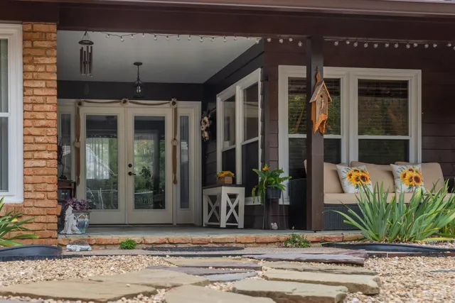 a view of a glass door and a window