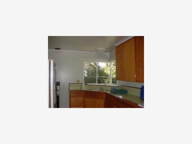 670 Covington Road Los Altos, CA 94024 - Photo 4 of 8 a open kitchen with a sink and large window