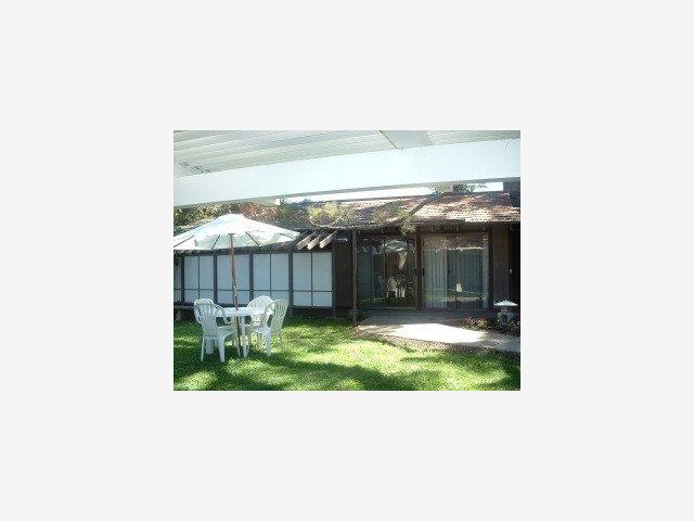 670 Covington Road Los Altos, CA 94024 - Photo 7 of 8 a view of house with backyard and porch
