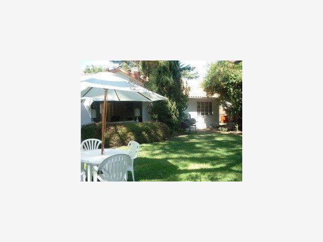 670 Covington Road Los Altos, CA 94024 - Photo 8 of 8 a picture of a bench in the backyard of a house
