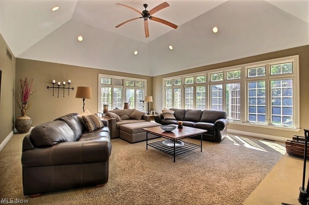 12430 Falcon Ridge Road Chesterland, OH 44026 - Photo 9 of 28 Additional great room view shows great space
for all your entertaining needs. The trayed ceiling and recessed lighting give you an awesome open and airy feeling throughout this grand room