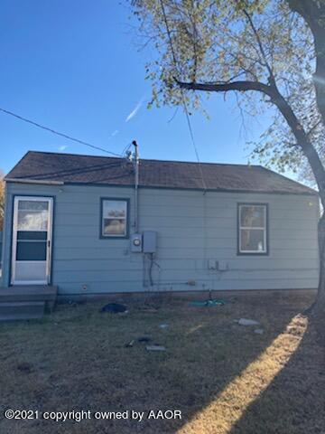 4608 Preston Street Amarillo, TX 79110 - Photo 8 of 9 a view of a house with a yard