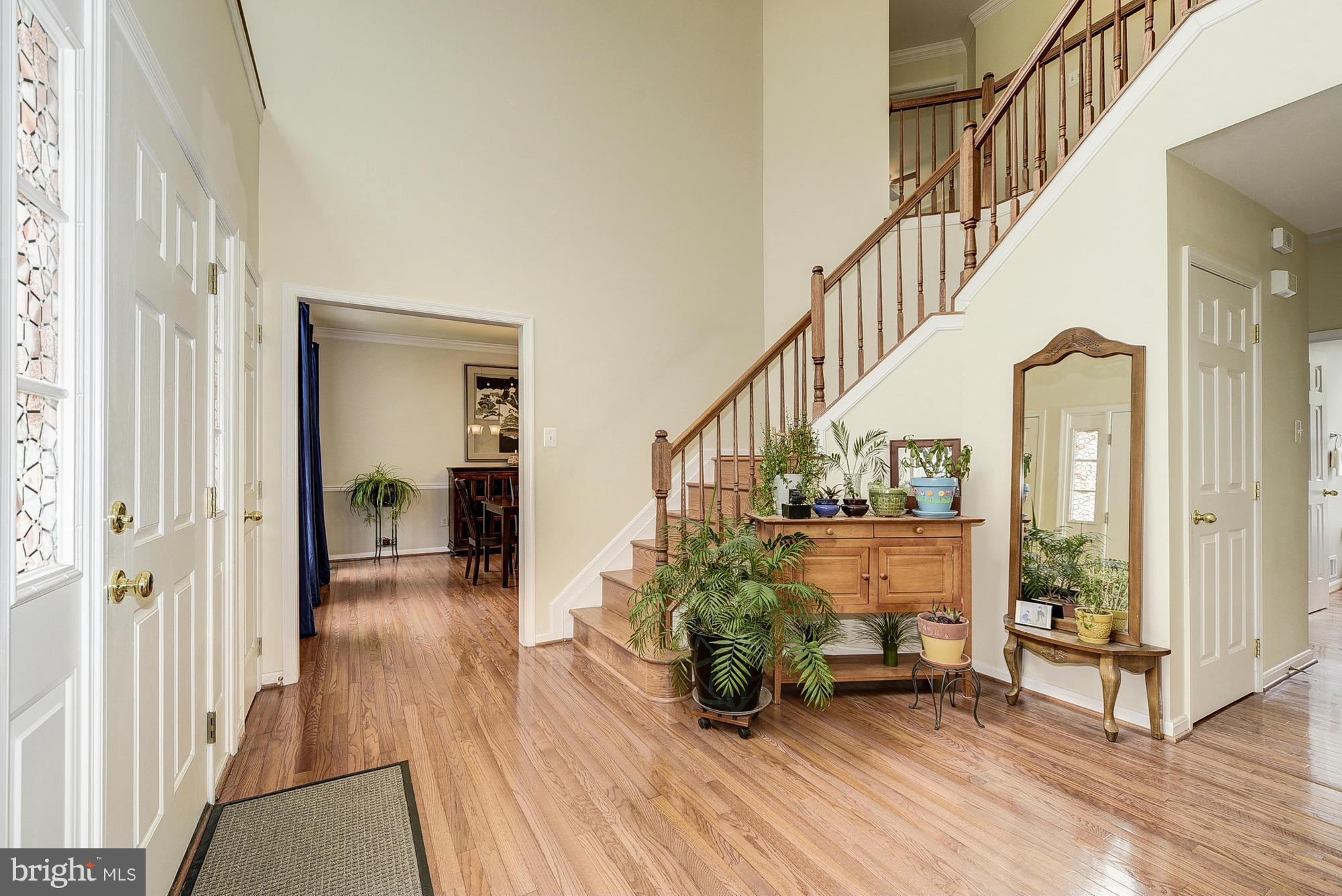11204 Snowden Pond Road Laurel, MD 20708 - Photo 2 of 30 a view of entryway with wooden floor and a front door