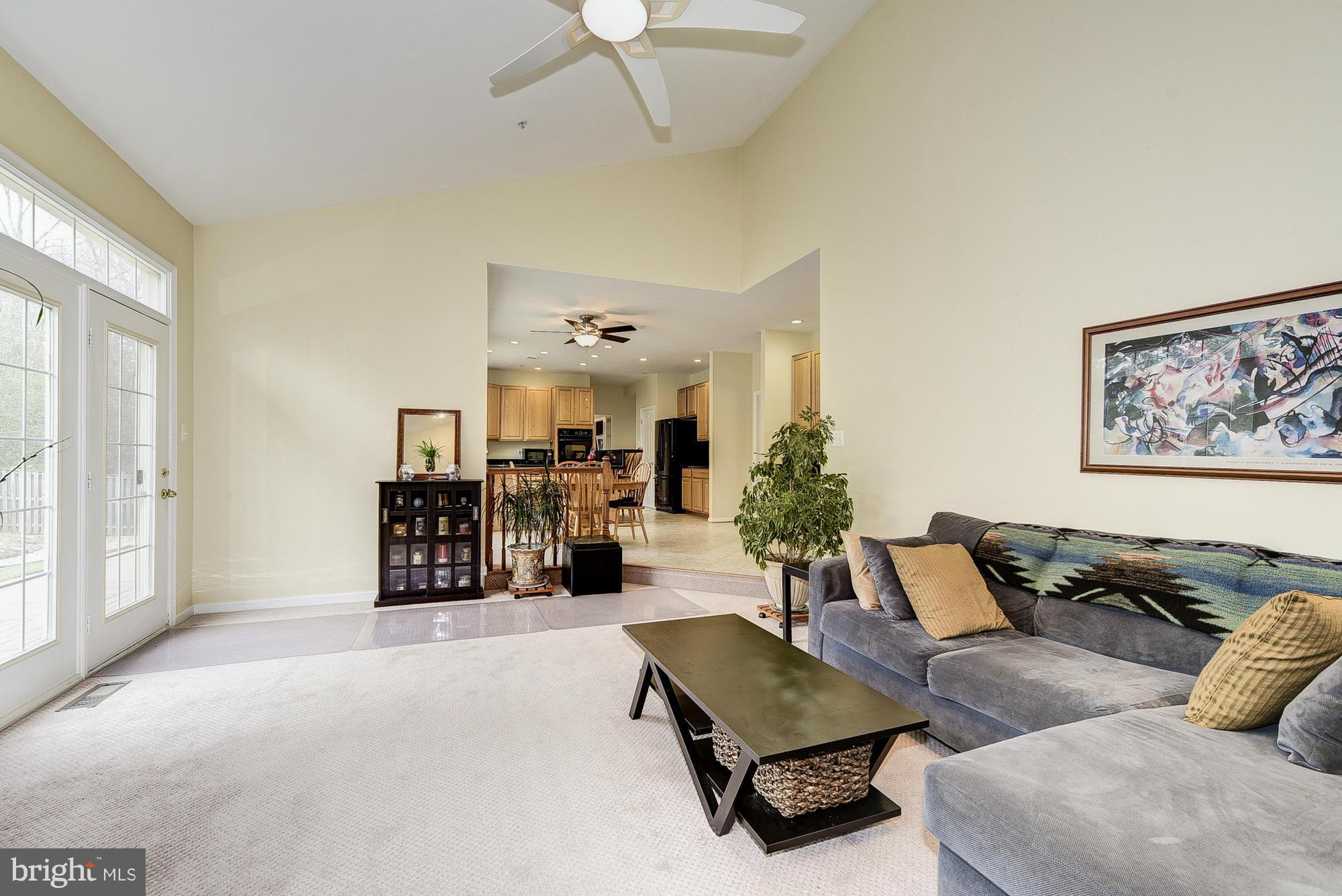 11204 Snowden Pond Road Laurel, MD 20708 - Photo 14 of 30 a living room with furniture and a large window
