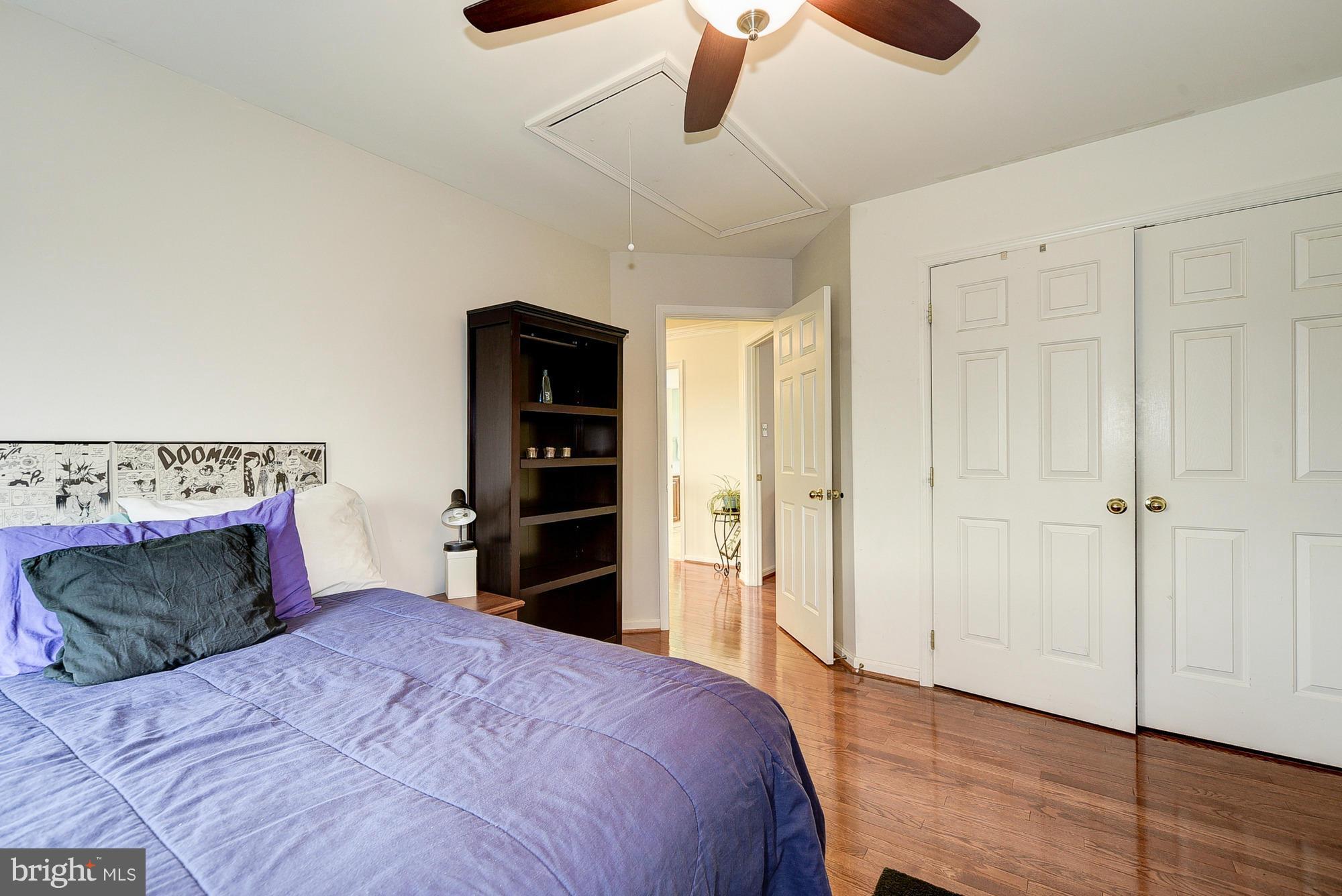 11204 Snowden Pond Road Laurel, MD 20708 - Photo 24 of 30 a bedroom with a bed and a closet