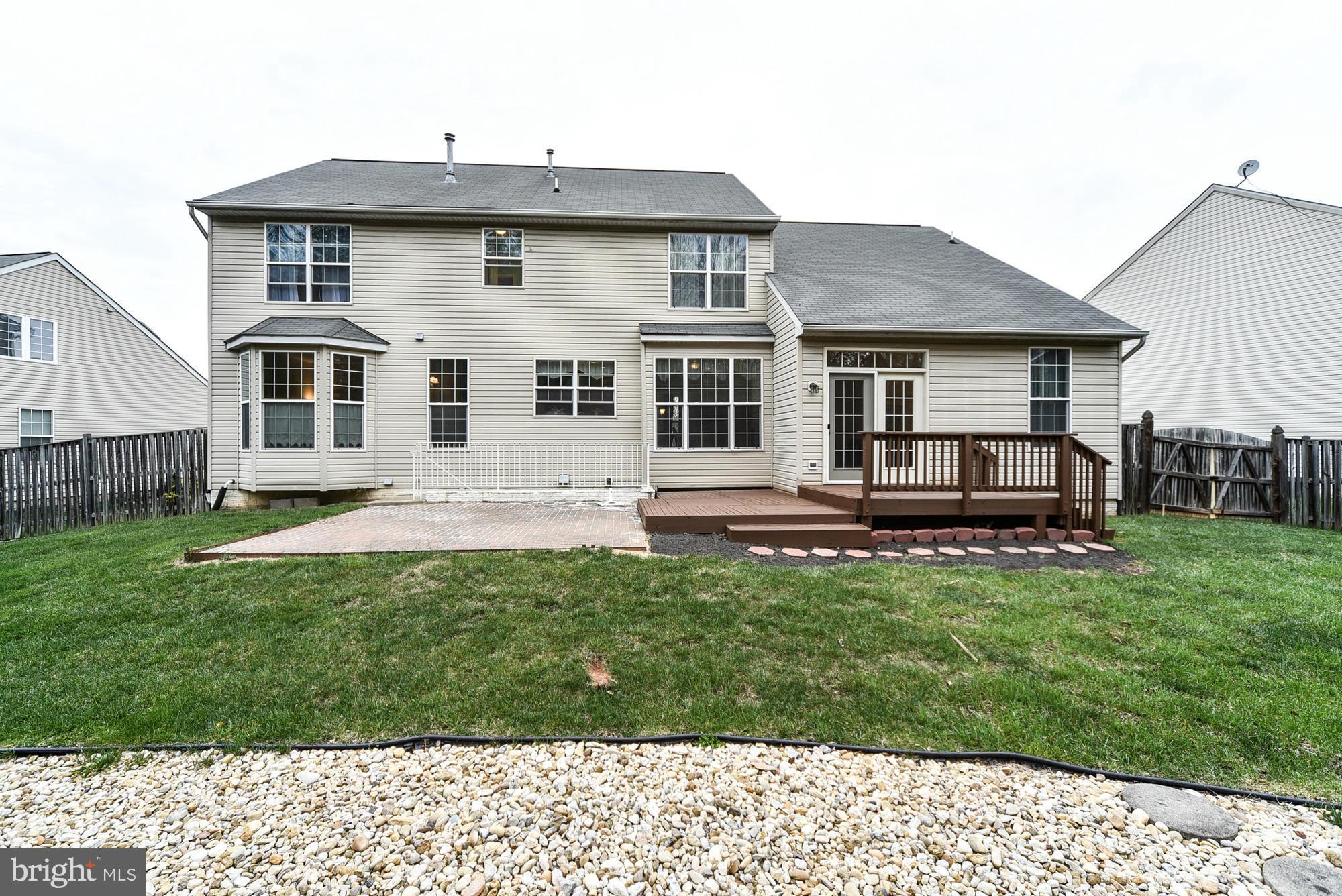 11204 Snowden Pond Road Laurel, MD 20708 - Photo 30 of 30 a house view with a garden space