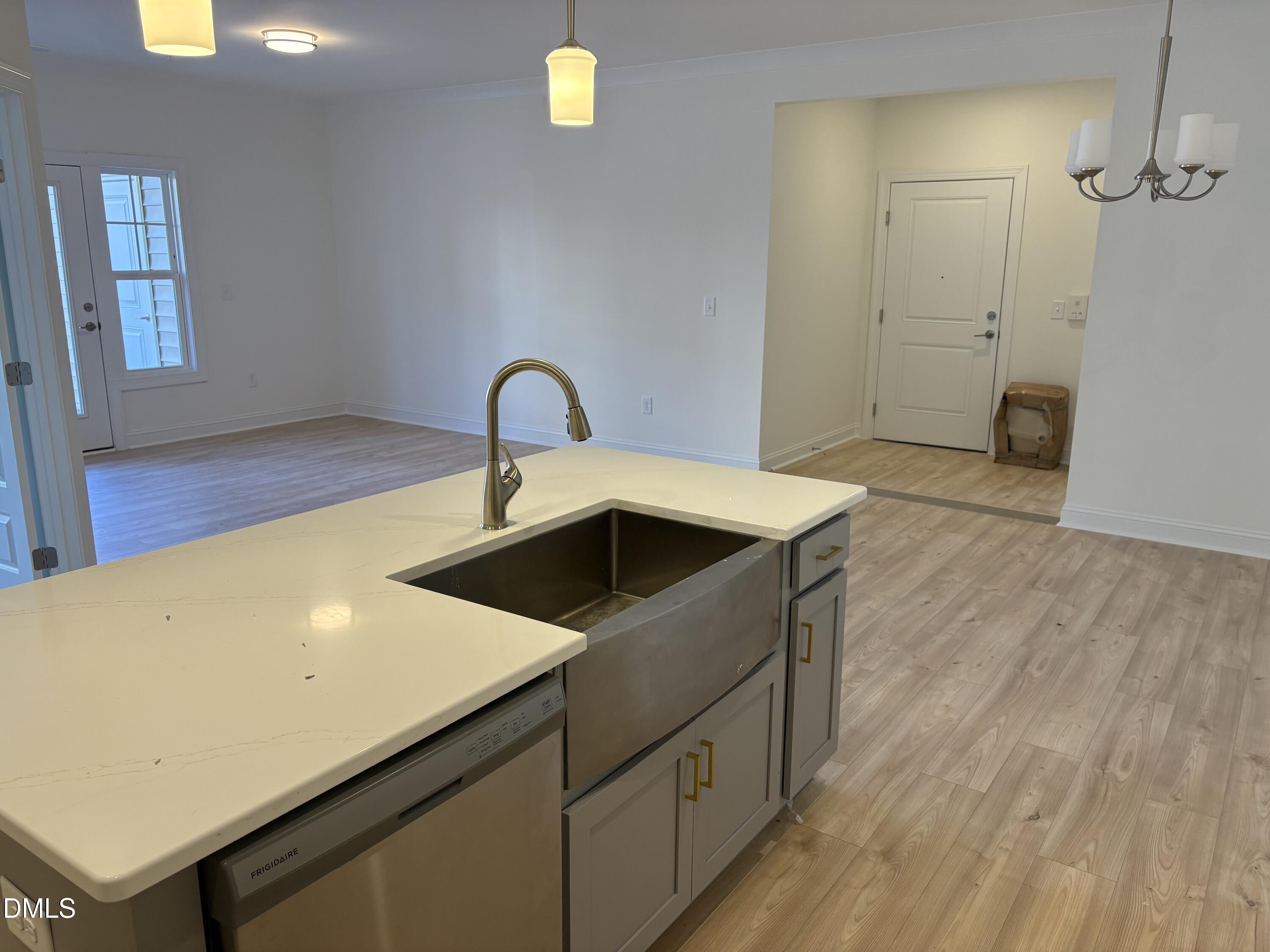 618 Weather Ridge Lane, Unit 28 Cary, NC 27513 - Photo 9 of 27 a kitchen with a sink and a stove top oven