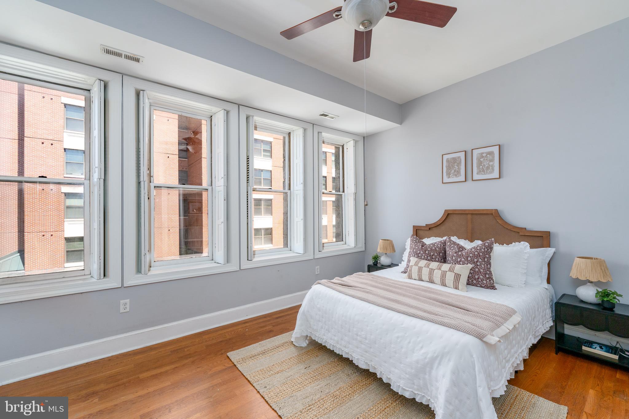 15 West Biddle Street, Unit 15C Baltimore, MD 21201 - Photo 13 of 33 a bedroom with a bed and window