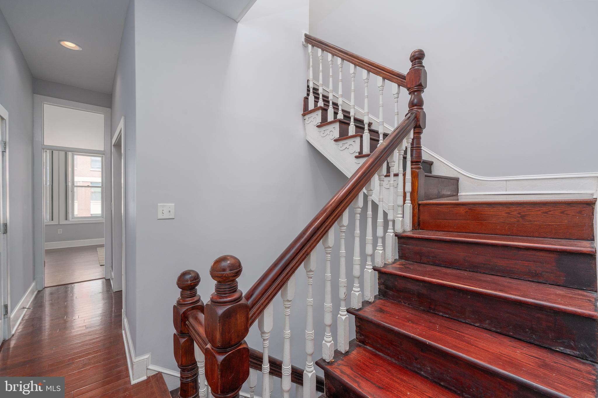 15 West Biddle Street, Unit 15C Baltimore, MD 21201 - Photo 19 of 33 a view of entryway and hall with wooden floor