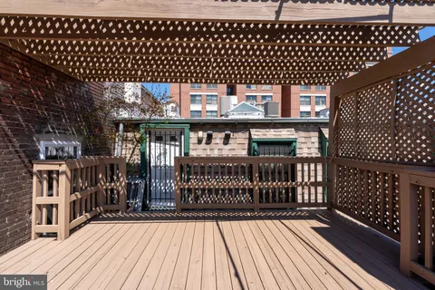 a view of a deck with wooden floor