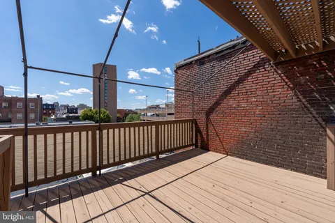 a terrace with wooden floor
