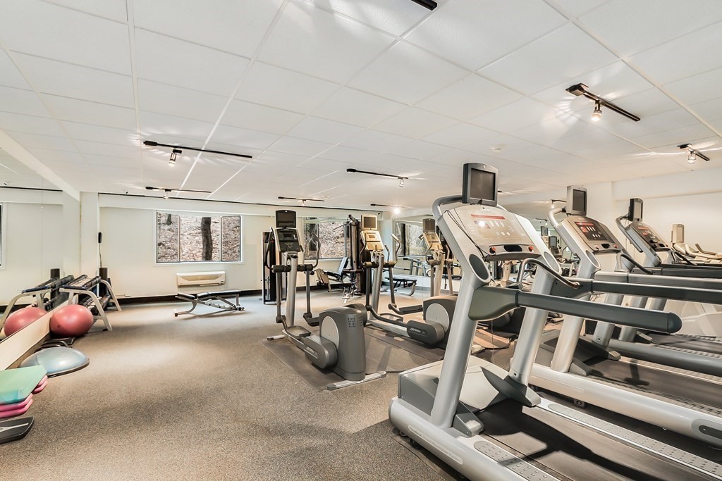 1500 Worcester Road, Unit 710 Framingham, MA 01702 - Photo 23 of 33 a view of a room with gym equipment