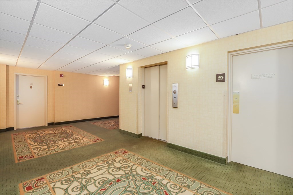 1500 Worcester Road, Unit 710 Framingham, MA 01702 - Photo 29 of 33 a view of a livingroom with a pathway
